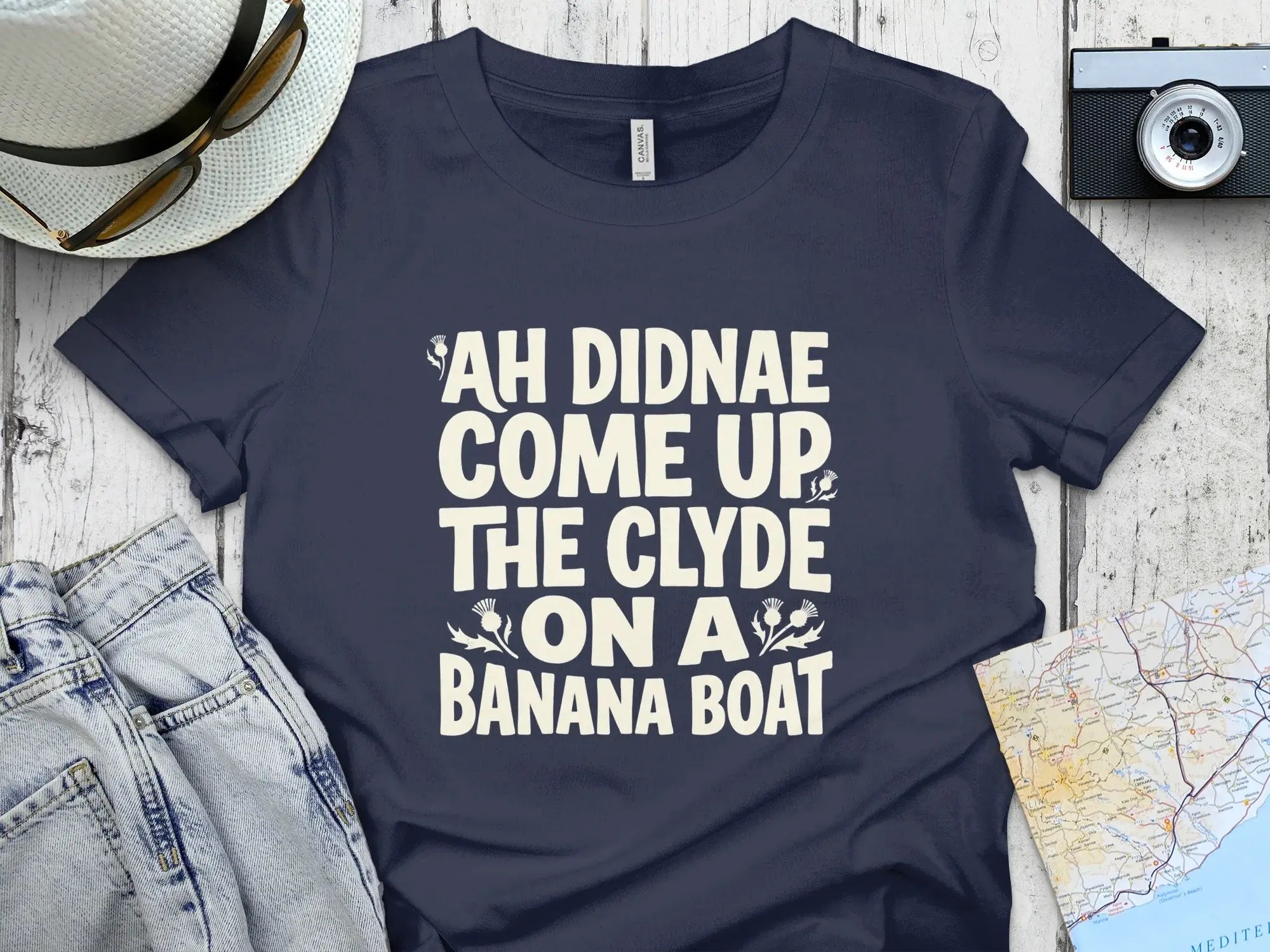 Navy t-shirt with white text "Ah didnae come up the Clyde on a banana boat."