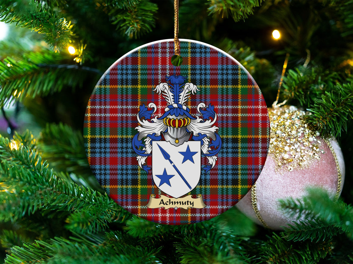 Achmuty Scottish clan ceramic ornament with family crest on a Caledonia tartan background, hanging on a Christmas tree