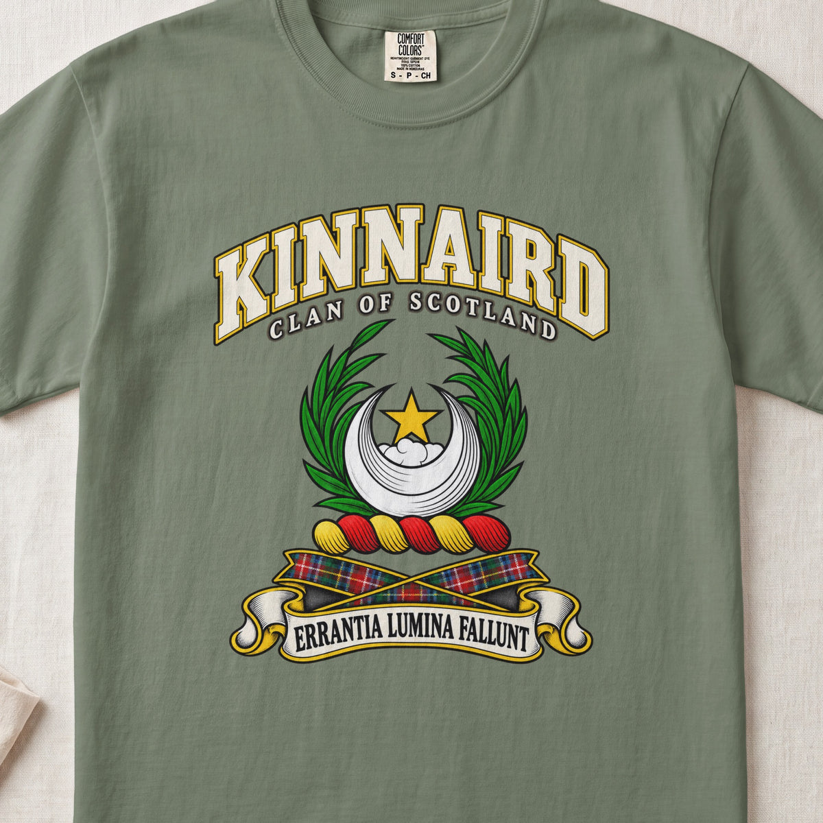 Kinnaird Scottish clan T-shirt in Moss, front view with a silver crescent, gold star and green leafy branches and motto design.