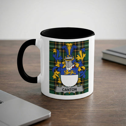 White mug with black rim, displaying Canton coat of arms on checkered background.