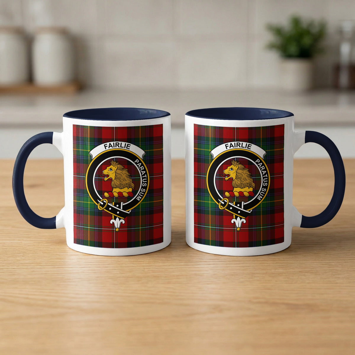 Pair of Fairlie Scottish family crest 11 oz mugs with navy accents and a tartan background