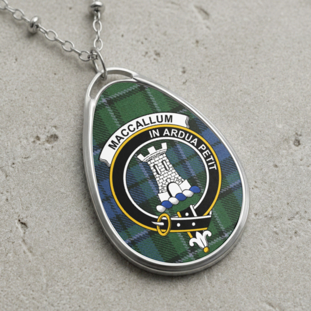 MacCallum tartan oval pendant with clan crest and Latin motto.