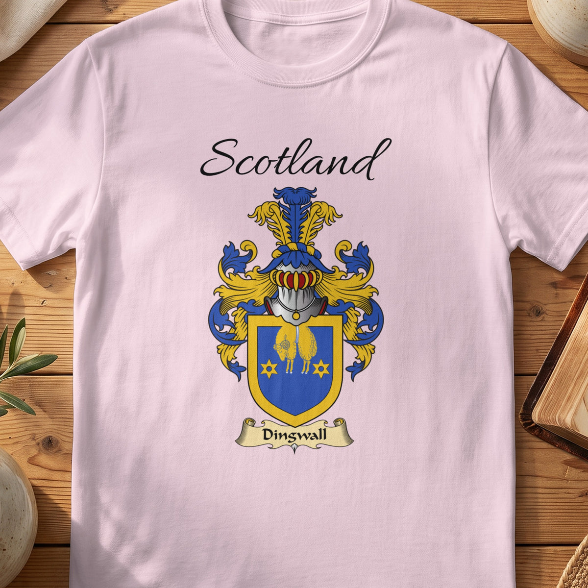 Light Pink Dingwall Scottish family shield T-shirt featuring a gold border and gold motifs on blue
