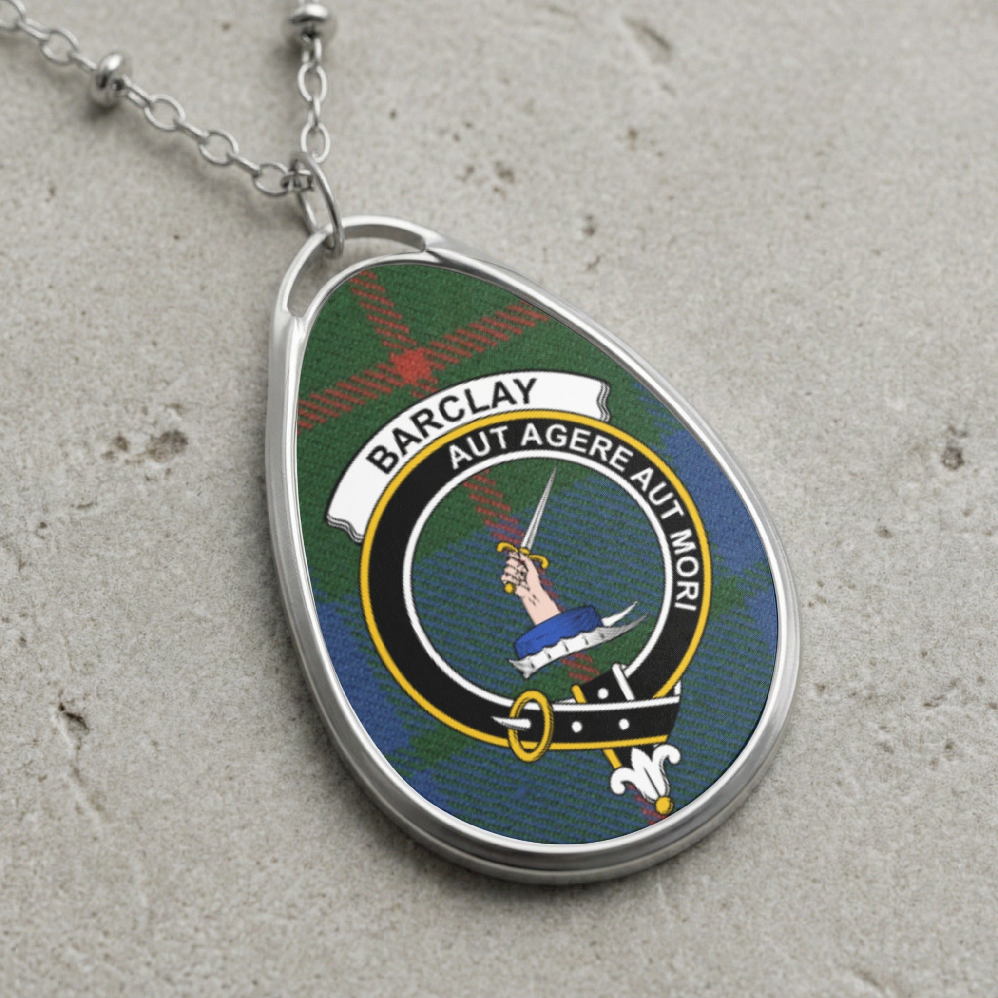 Barclay clan Scottish tartan necklace with clan crest and Aut Agere Aut Mori motto on tartan background
