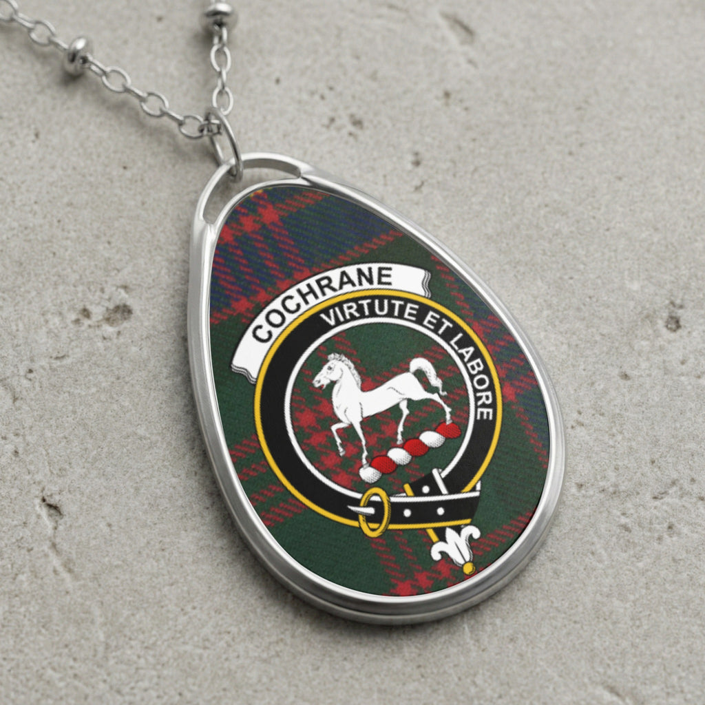 Cochrane clan Scottish tartan necklace with clan crest and Virtute et Labore motto on tartan background