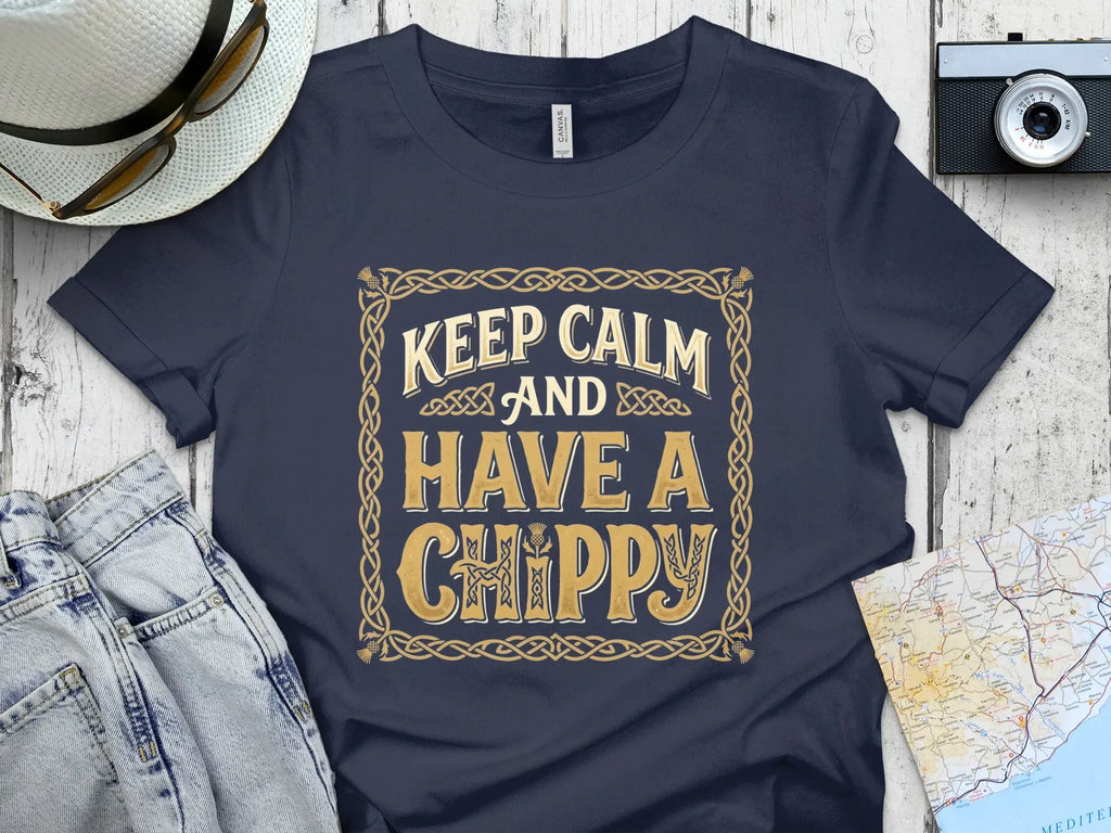 Navy t-shirt with "Keep Calm and Have a Chippy" text in decorative border.