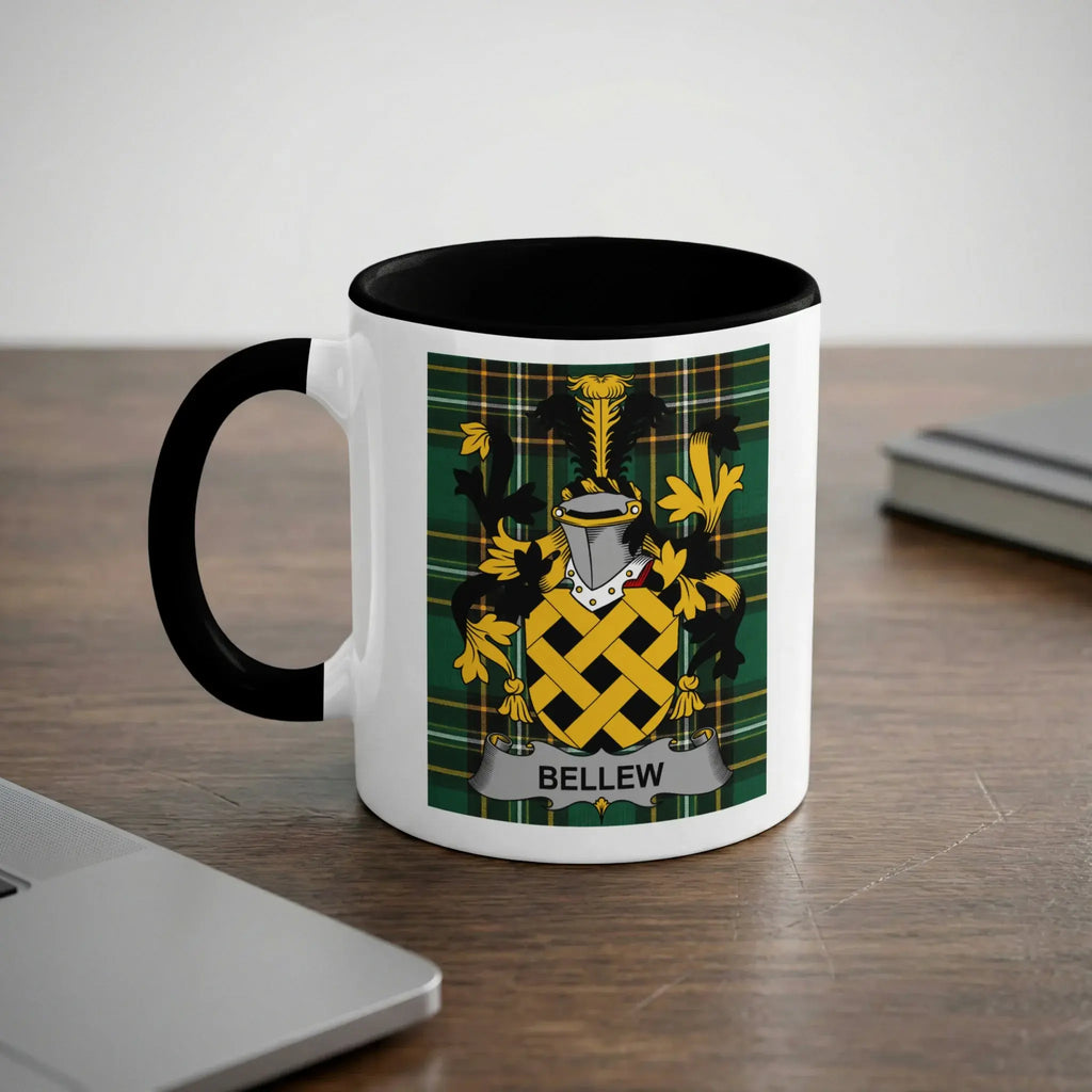 White mug with black handle featuring a yellow and green tartan crest with the word BELLEW.