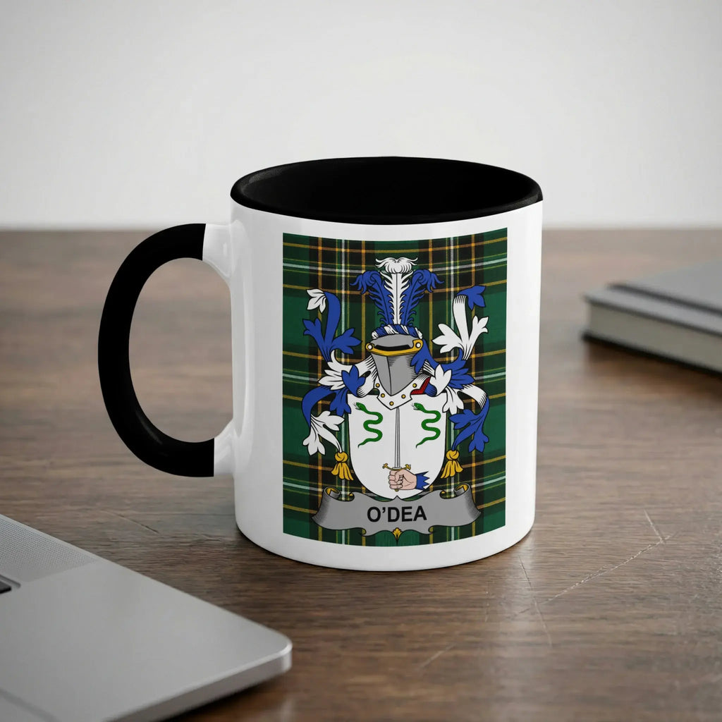White mug with black handle and interior, displaying the O'Dea family crest.