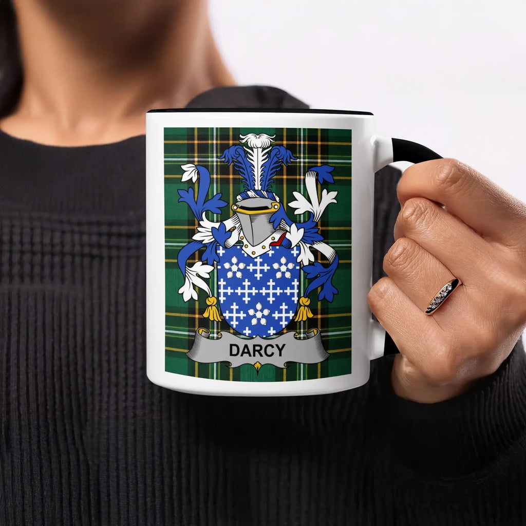 Black and white mug featuring the Darcy family crest on a tartan background.