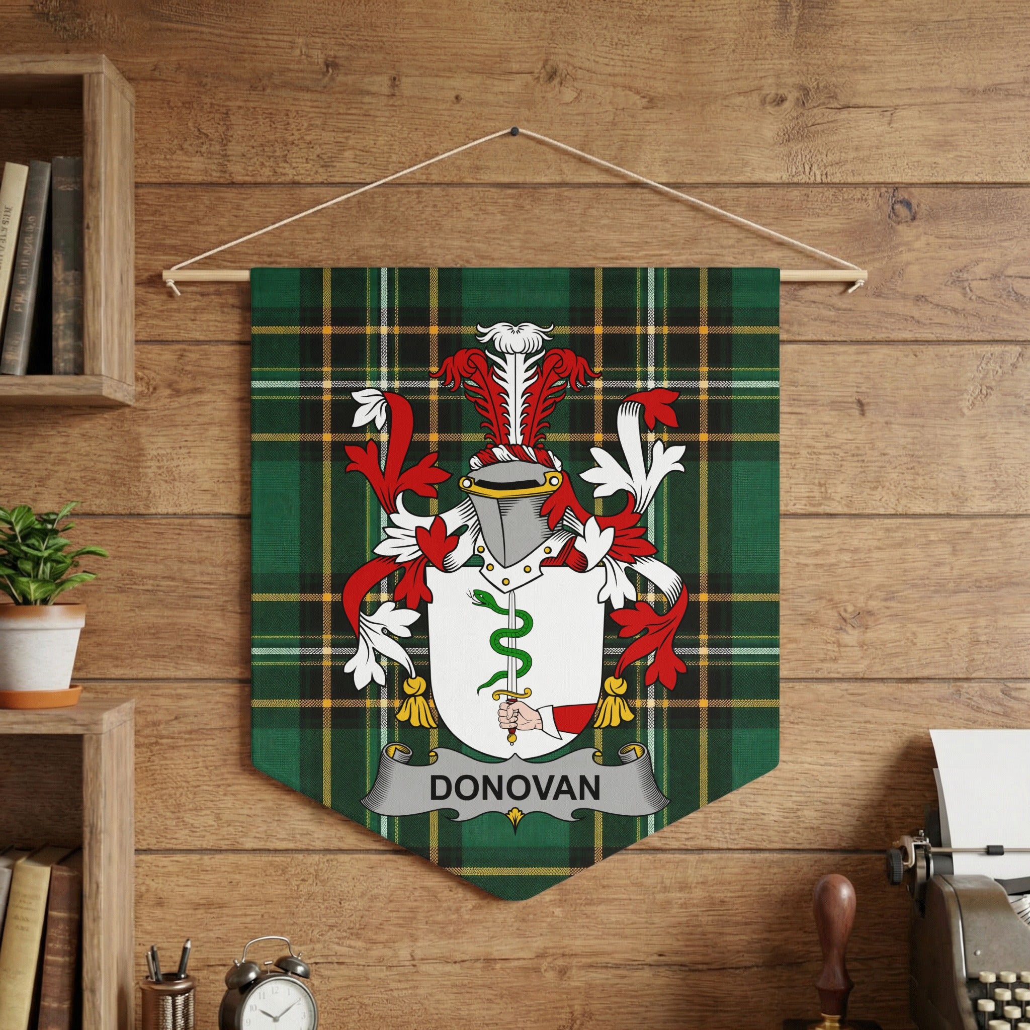 Donovan coat of arms on green tartan fabric banner.