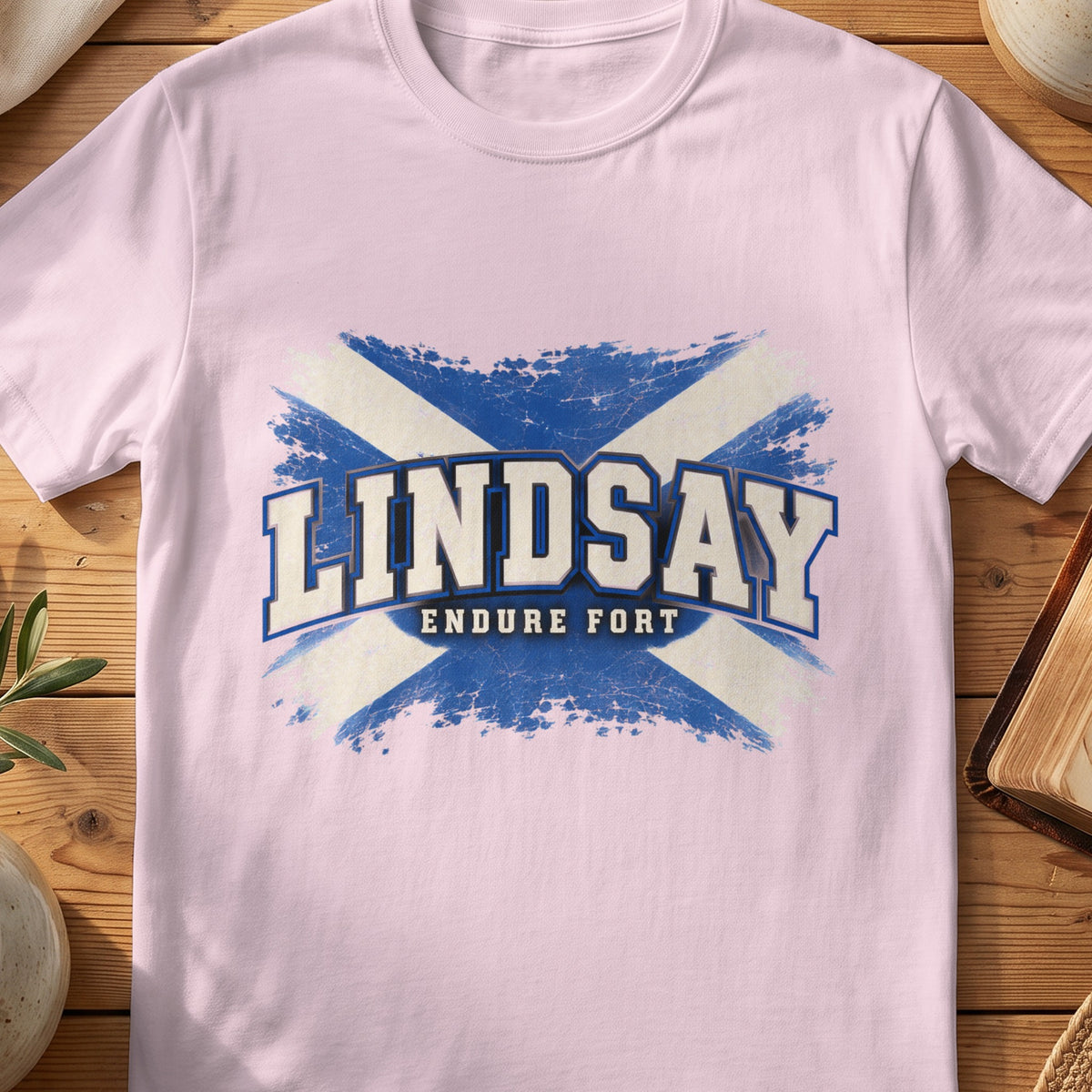 Lindsay Scottish Saltire T-shirt in Light Pink, with distressed blue and cream flag and “Endure Fort” lettering.