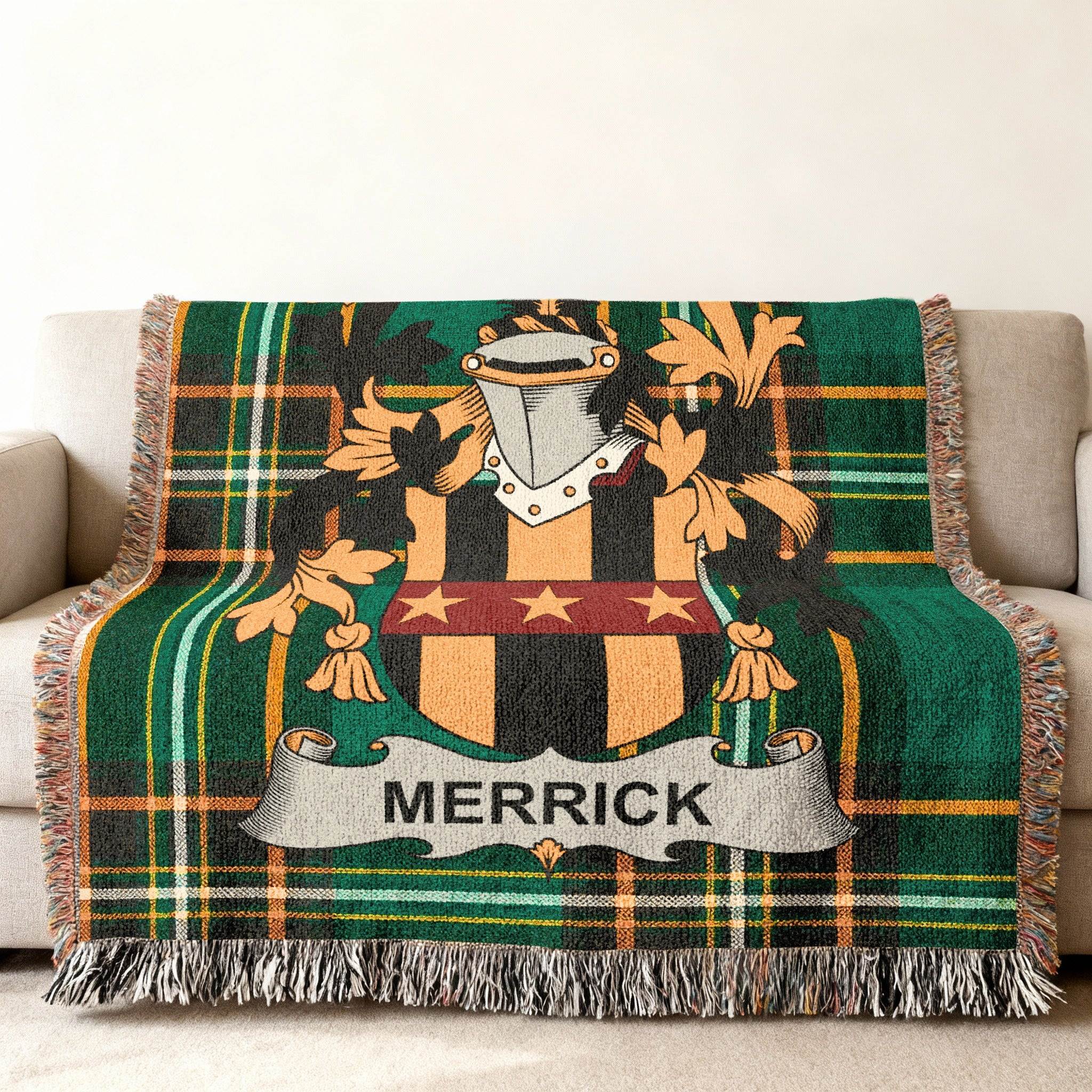 Merrick family crest on a green plaid throw blanket.