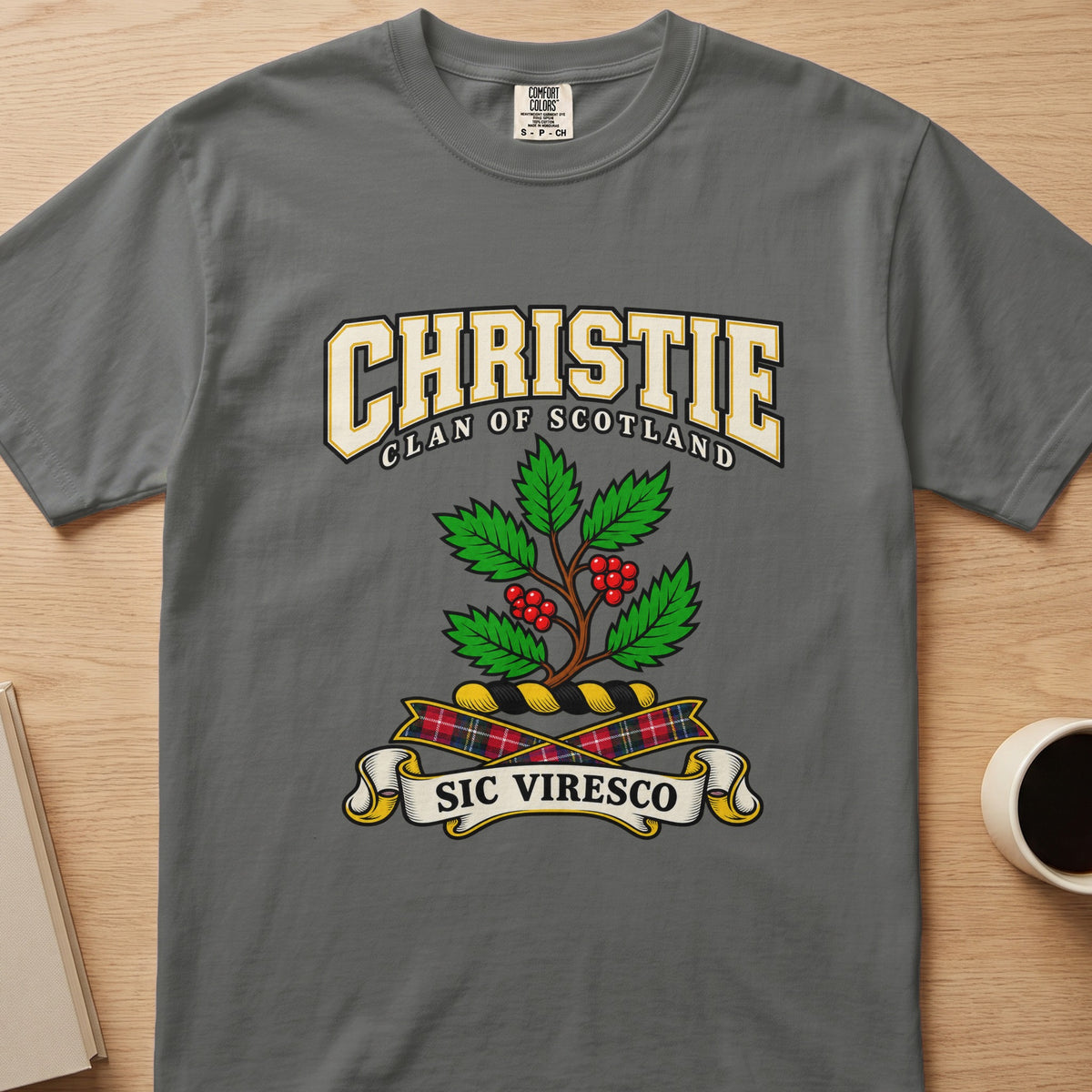 Christie clan T-shirt in gray, front view with green leafy branch with red berries