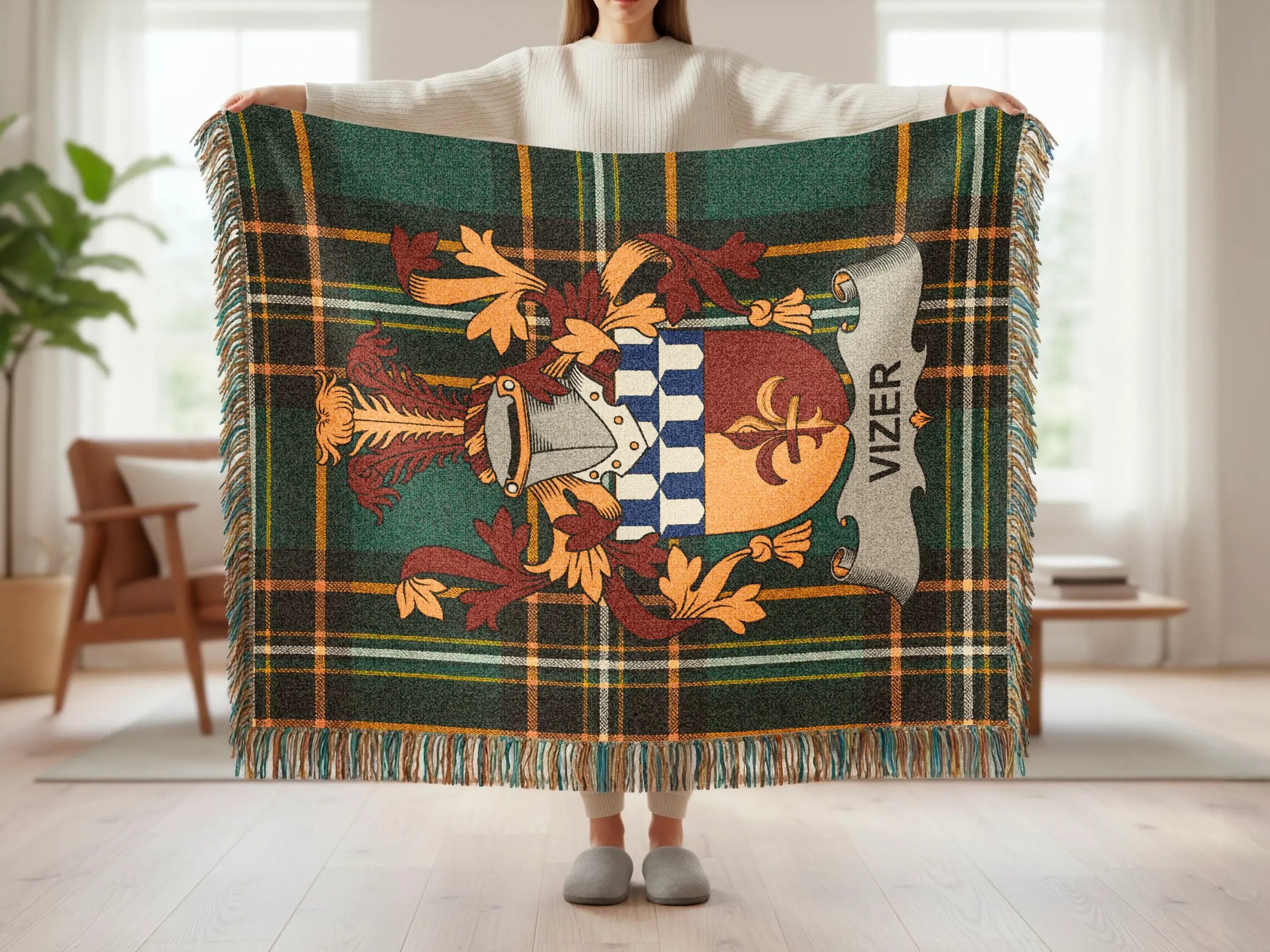 Green tartan blanket with heraldic crest and "VIZER" text.