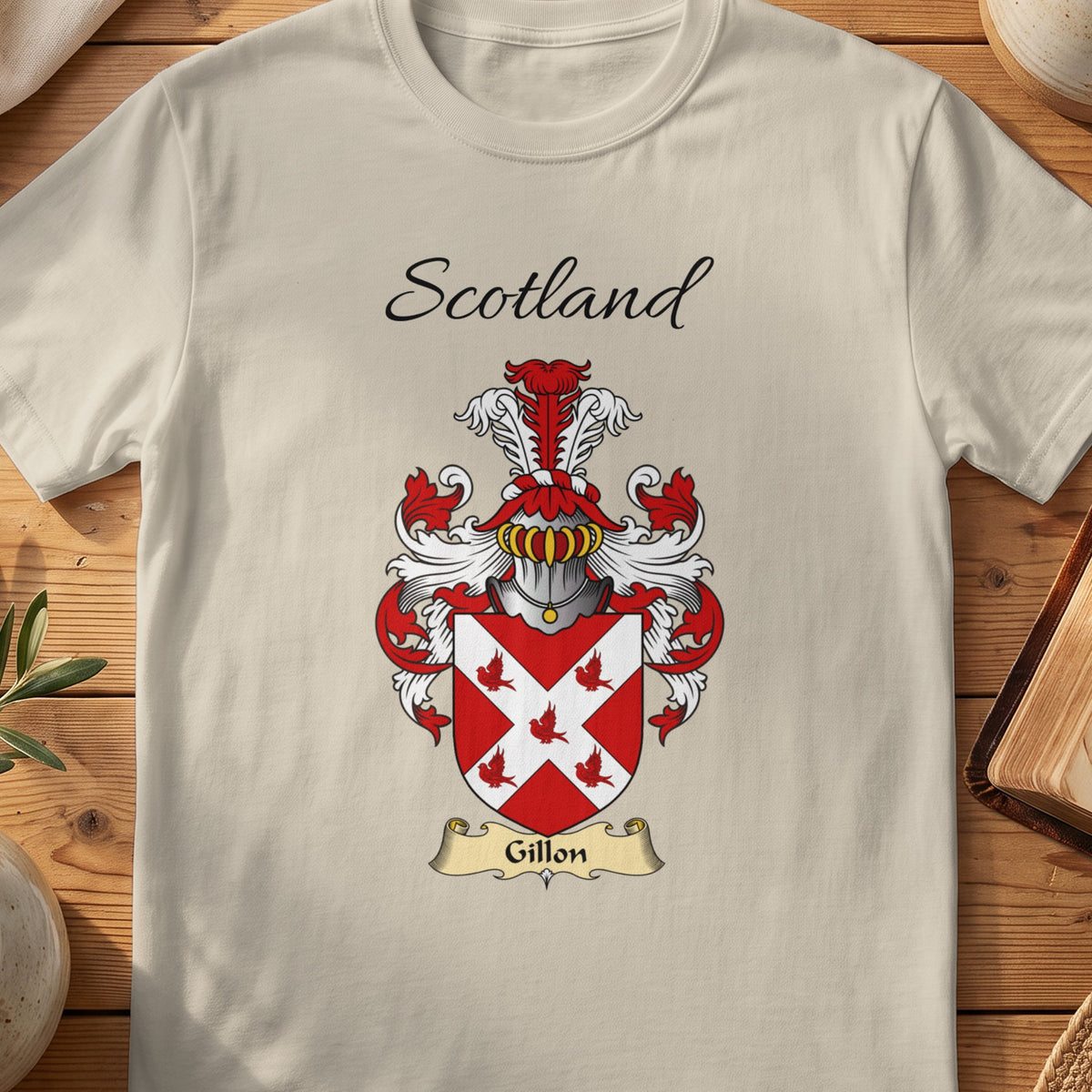 Sand Gillon Scottish family shield T-shirt featuring a white diagonal cross with small red birds