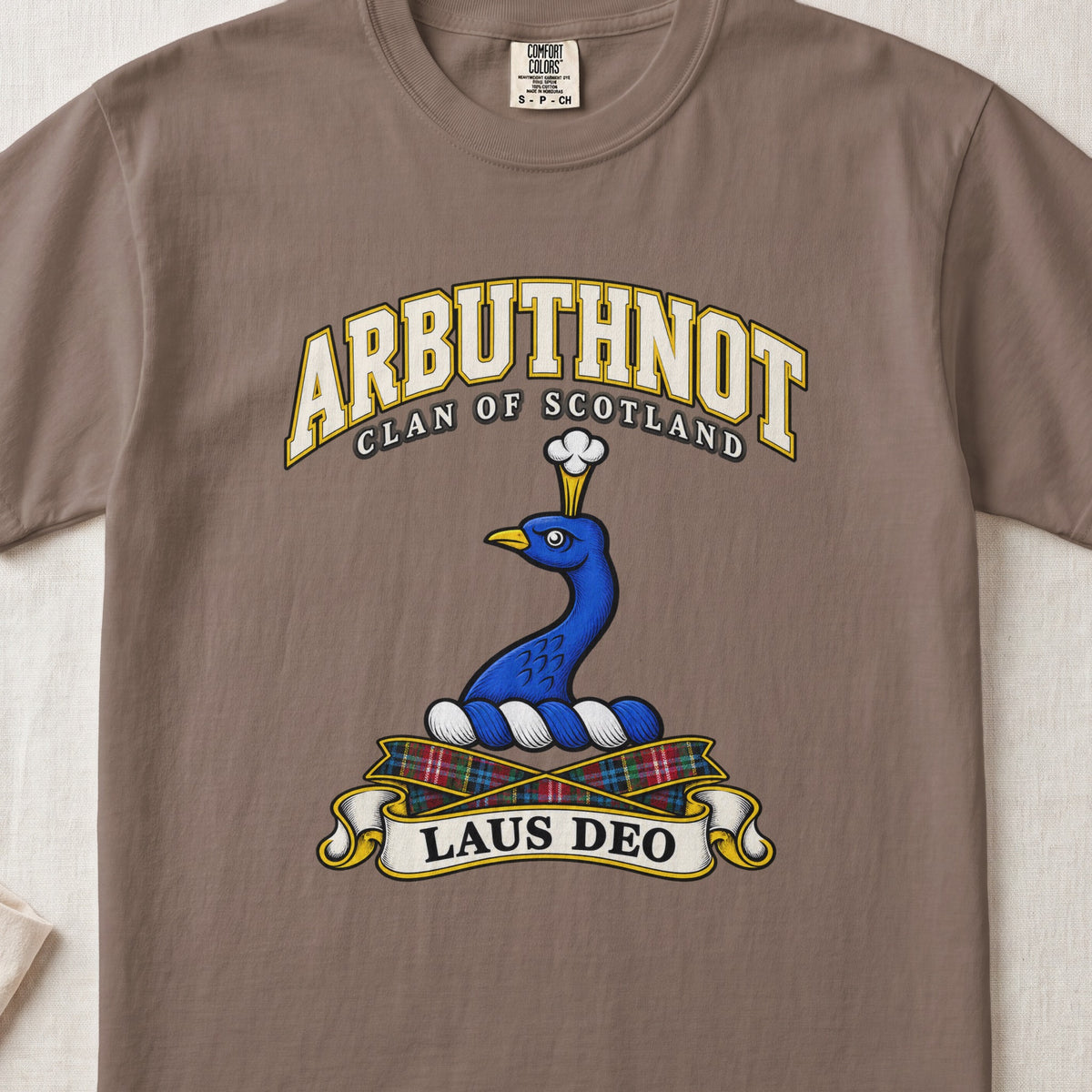 Arbuthnot Scottish clan T-shirt in Espresso, front view with a blue peacock head and neck and motto design.