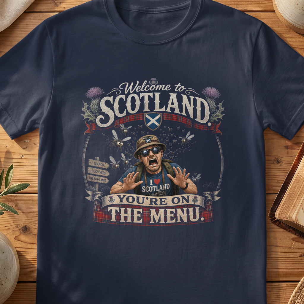 Navy Gildan 64000 unisex T-shirt flatlay with Welcome to Scotland You're on the Menu Scottish graphic design