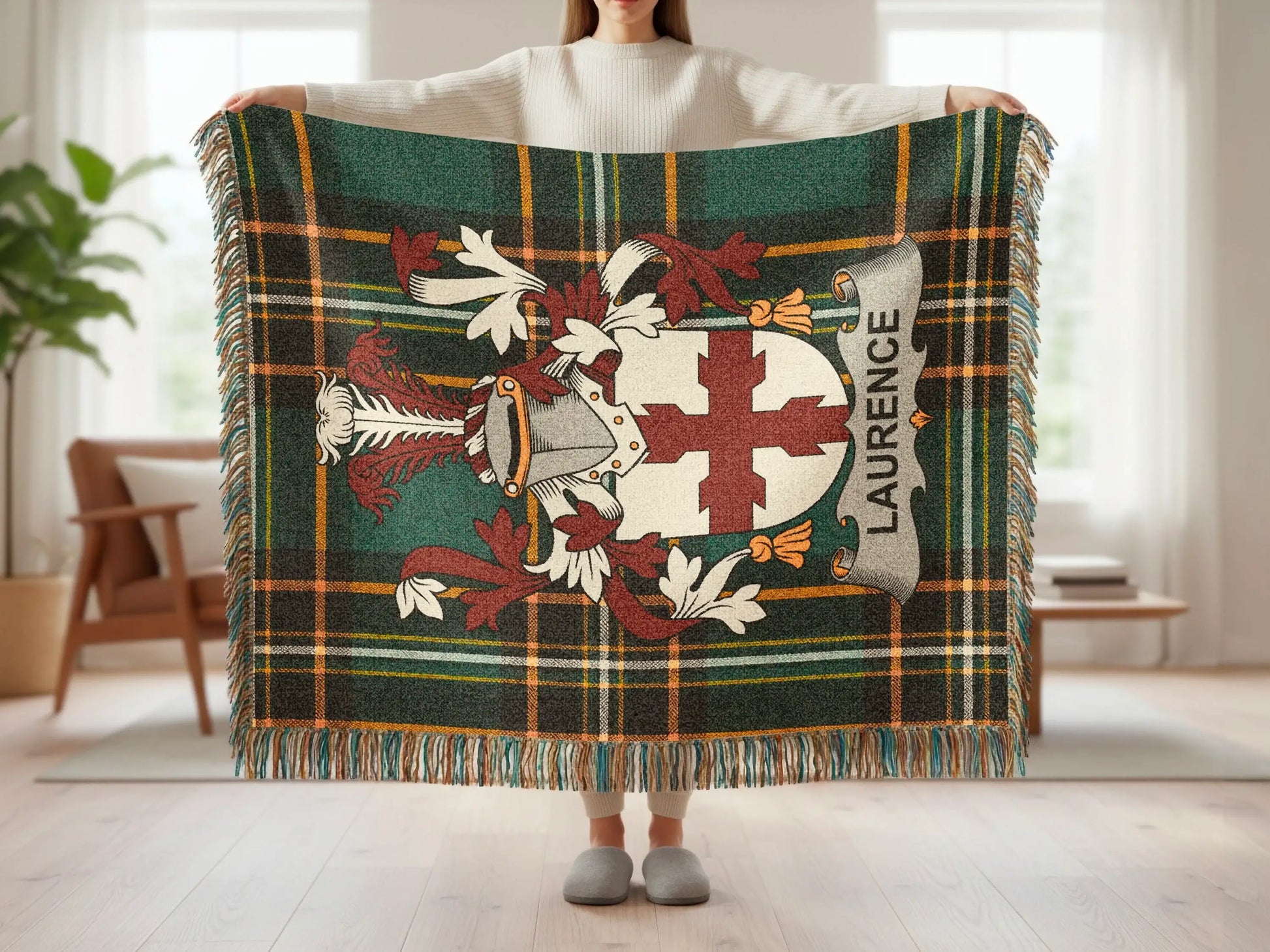 Tartan blanket with Laurence family crest and fringe.