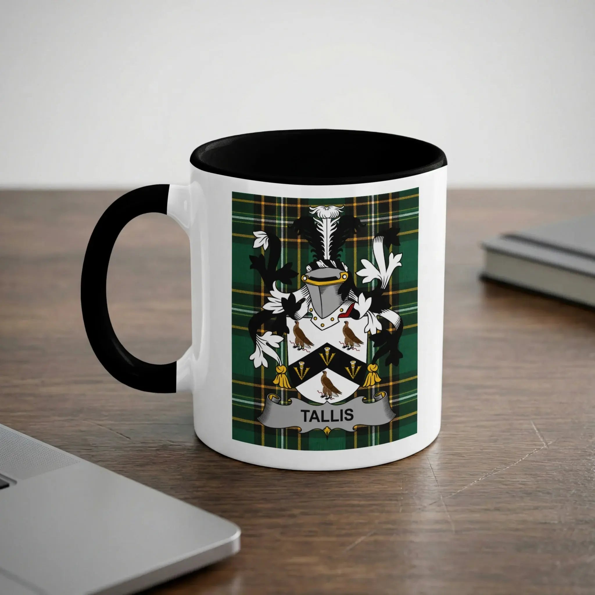 White mug with black handle featuring the Tallis family crest and plaid pattern.