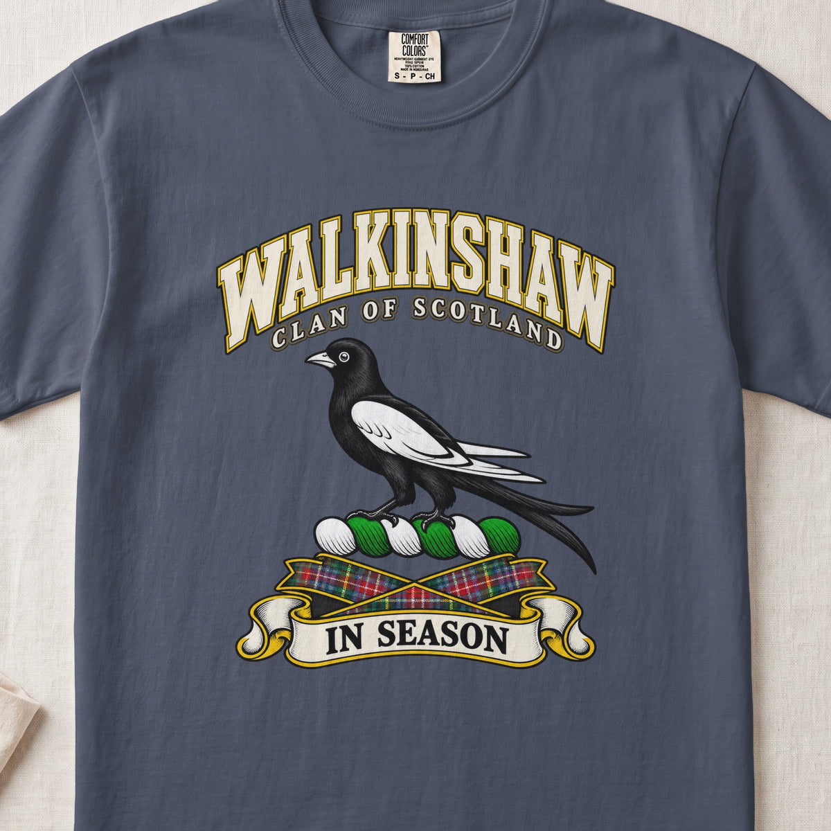 Walkinshaw Scottish clan T-shirt in Midnight, front view with a black and white magpie and motto design.