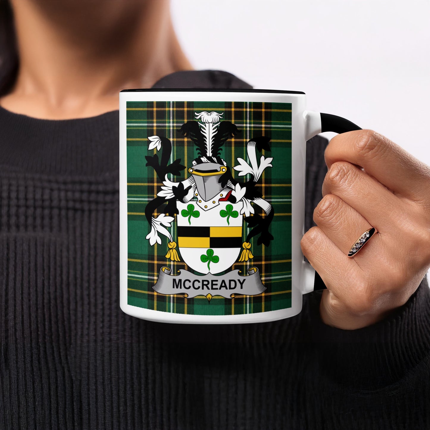 White mug with green tartan pattern and "MCCREADY" surname crest.