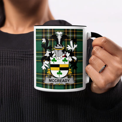 White mug with green tartan pattern and "MCCREADY" surname crest.