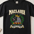 MacLaren graphic T-shirt in Black, front flat lay showing varsity lettering and crowned black and grey boar head with white tusks.