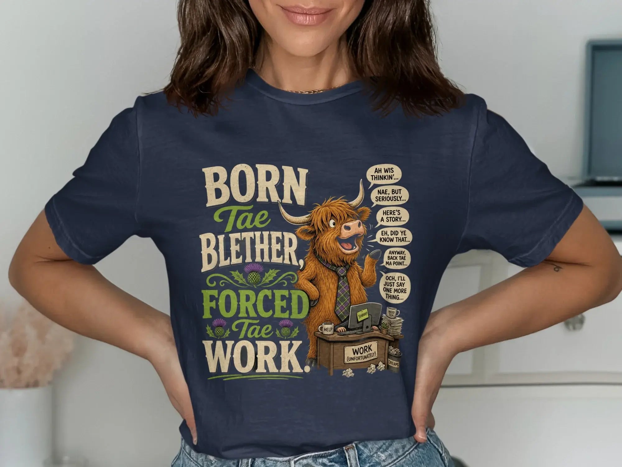 Highland cow illustration on dark blue t-shirt, "Born Tae Blether, Forced Tae Work."