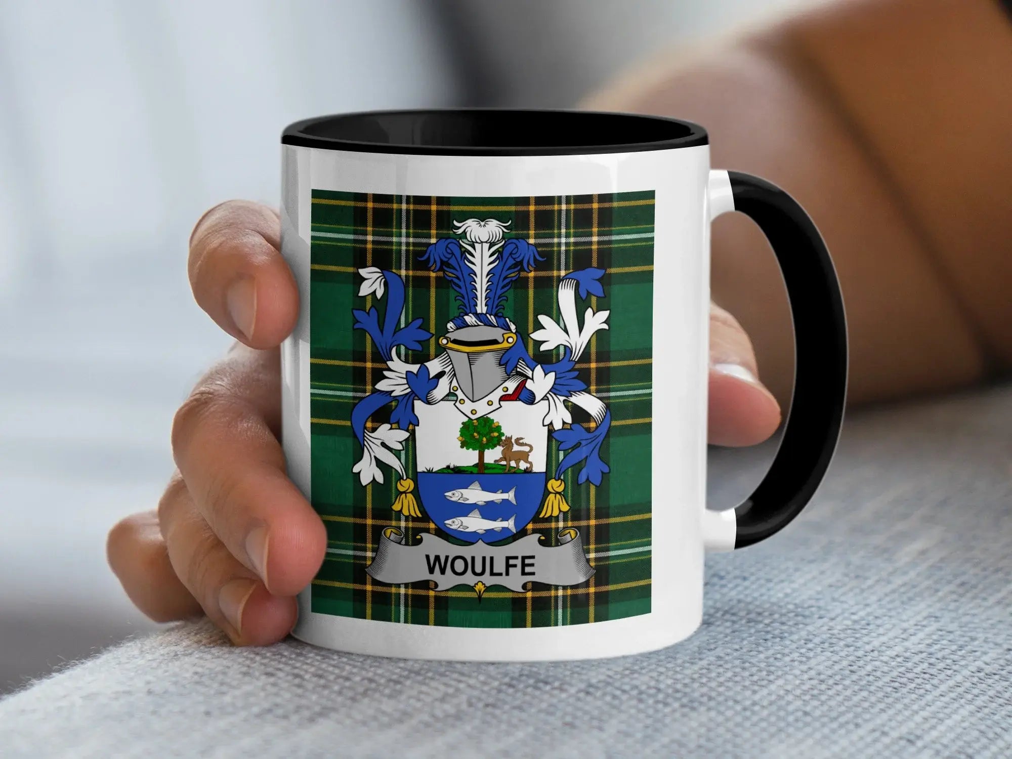Mug with the Woulfe coat of arms on a plaid background.