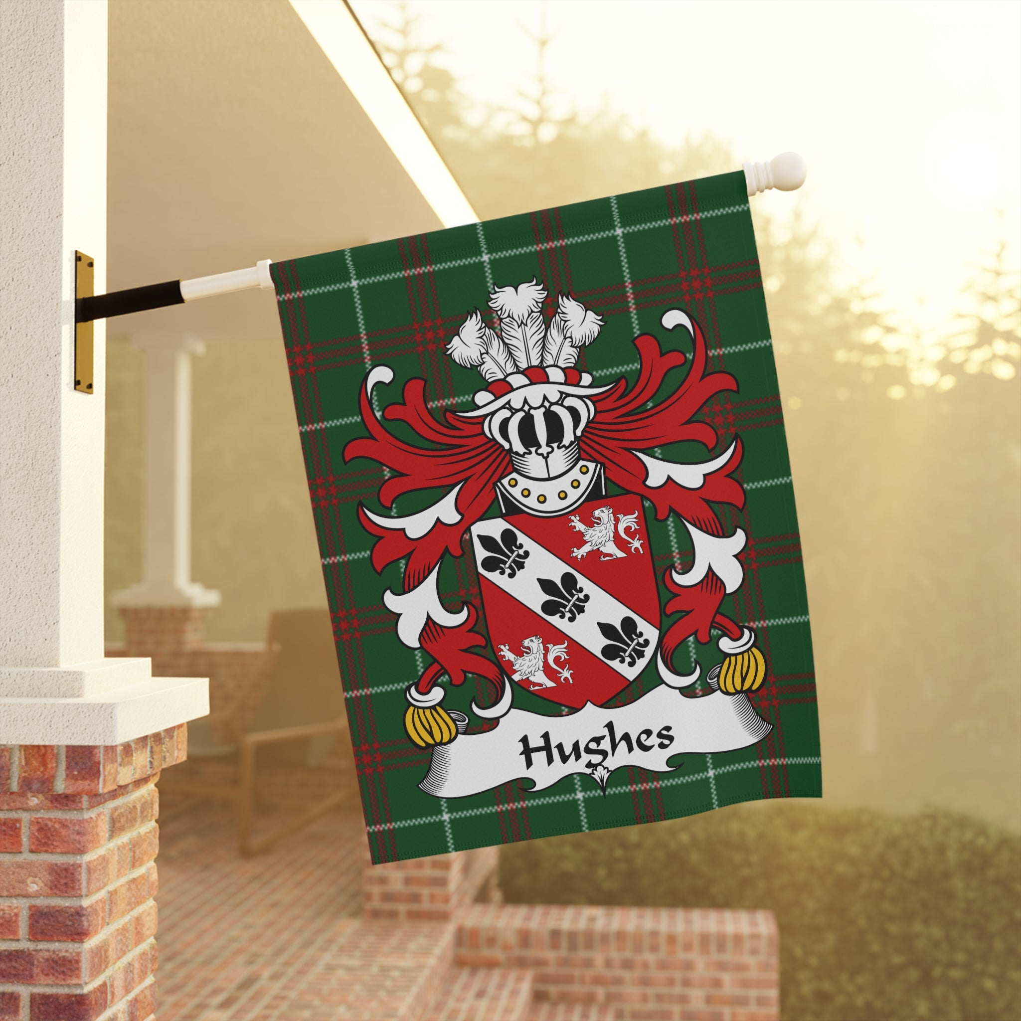 Hughes family crest on a green plaid flag displayed outside.