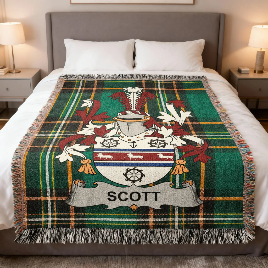 Scott family crest on a green plaid blanket with fringe.