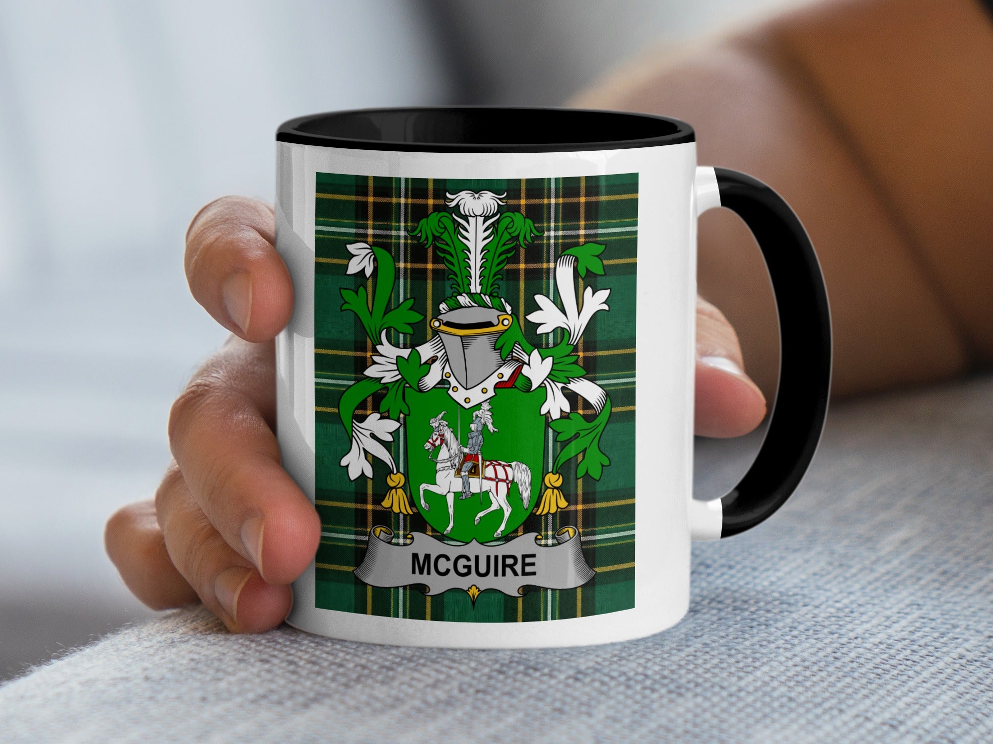 McGuire family crest Irish heritage mug — white ceramic with black handle on tartan