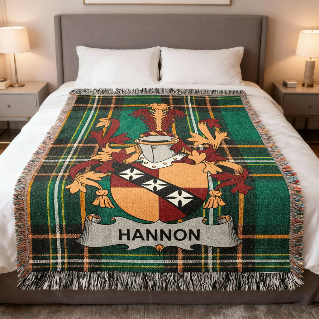 Tartan blanket with HANNON family crest in center.