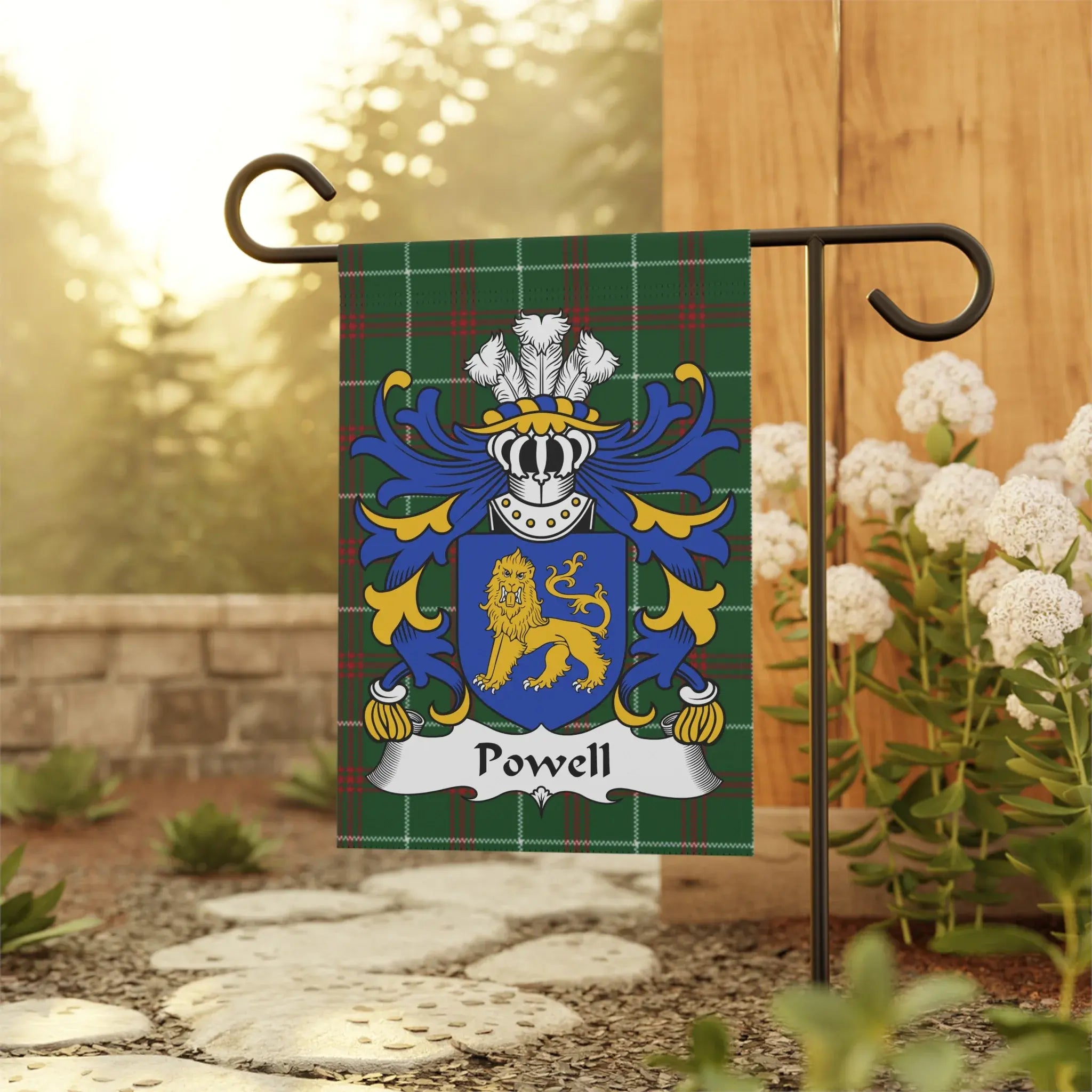 Powell family crest on a green plaid garden flag.