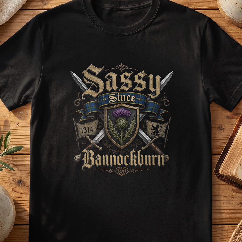 Black Gildan 64000 unisex T-shirt flatlay with Sassy Since Bannockburn 1314 Scottish graphic design