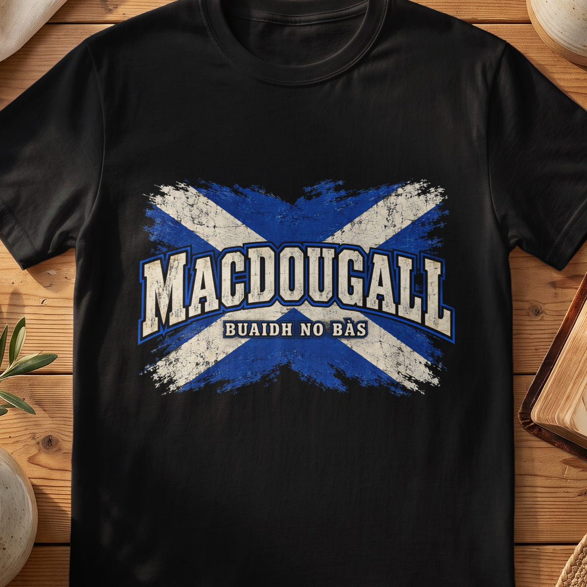 MacDougall Scottish Saltire T-shirt in Black, with distressed blue and cream flag and “Buaidh No Bàs” lettering.