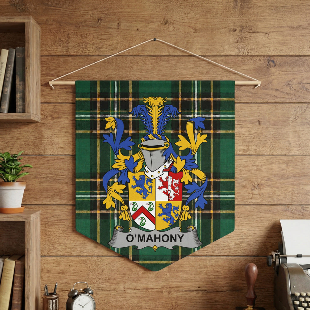 O'Mahony crest displayed on a green tartan banner hanging on a wooden wall.