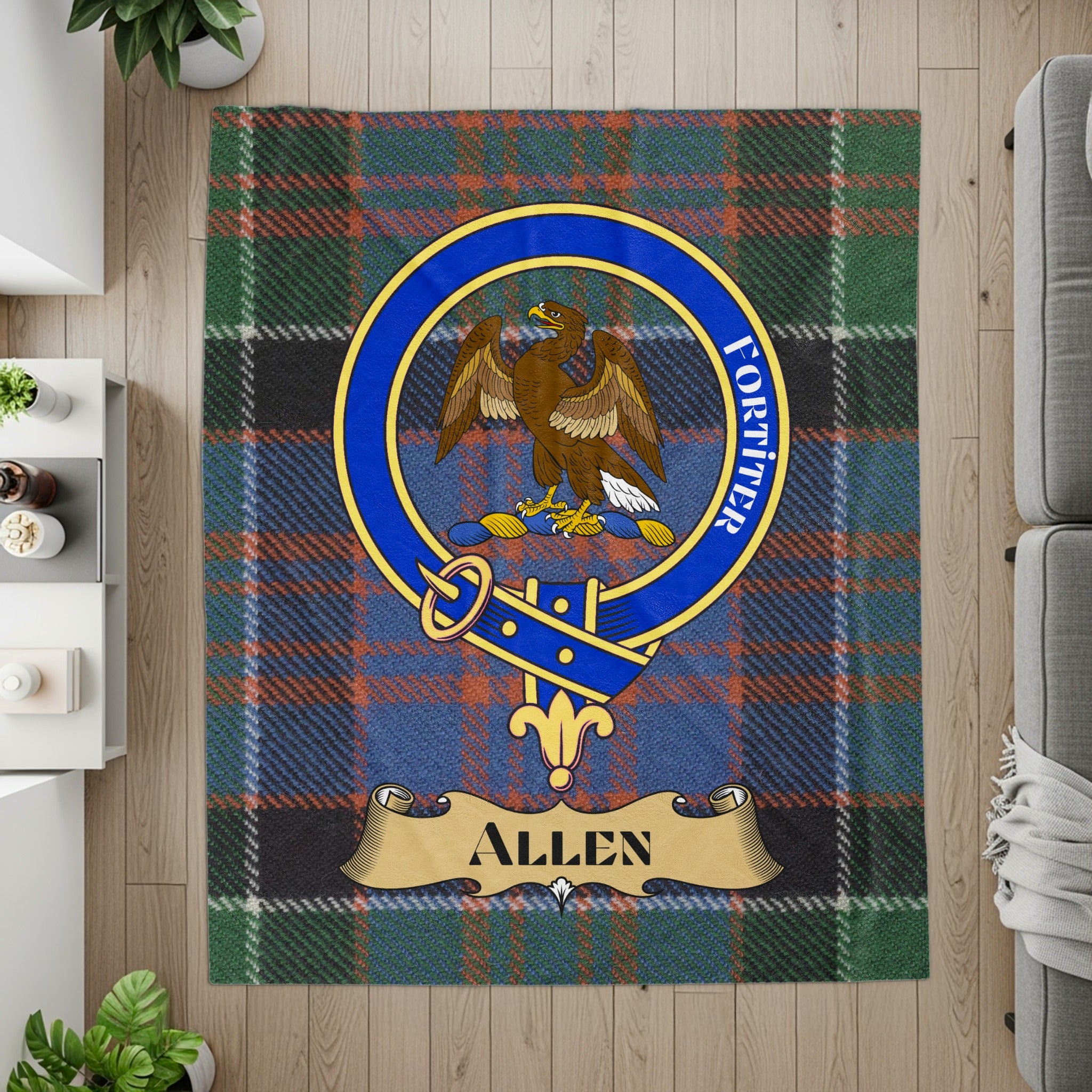 Allen crest with falcon on tartan printed throw — flat lay detail