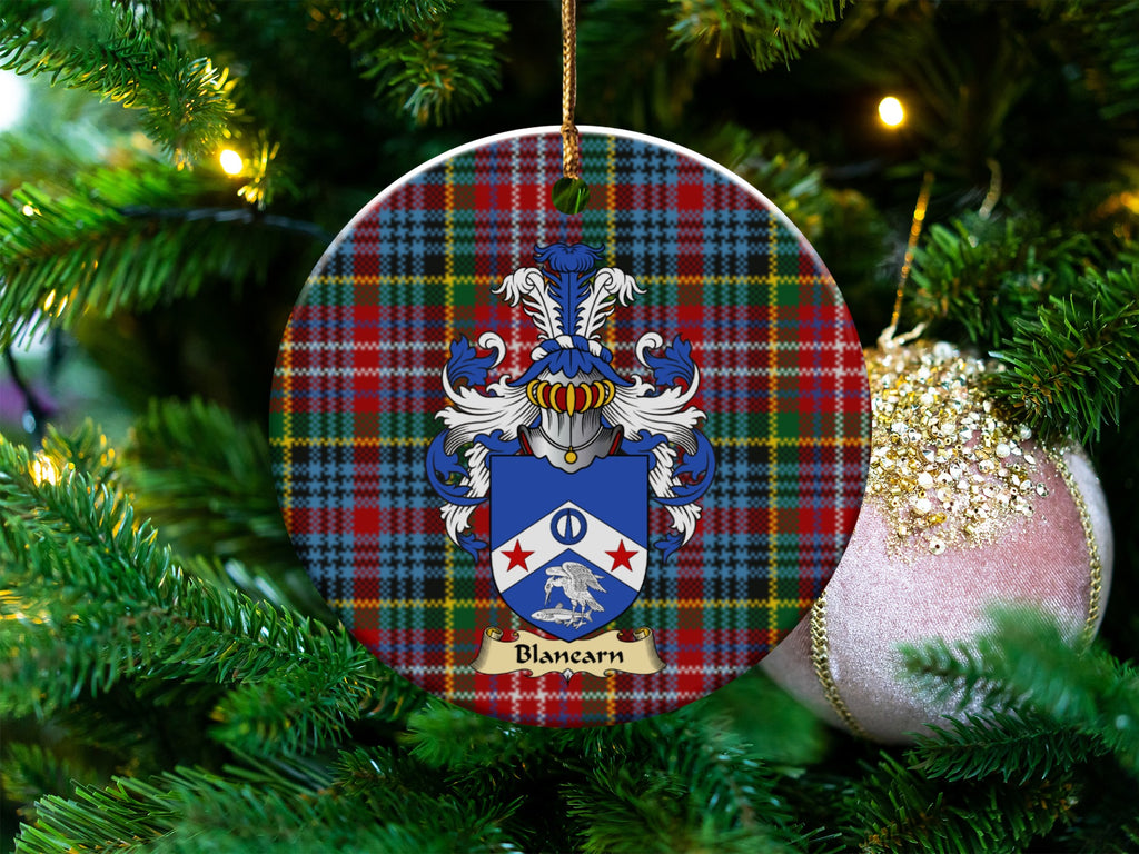 Blanearn Scottish clan ceramic ornament with family crest on a Caledonia tartan background, hanging on a Christmas tree
