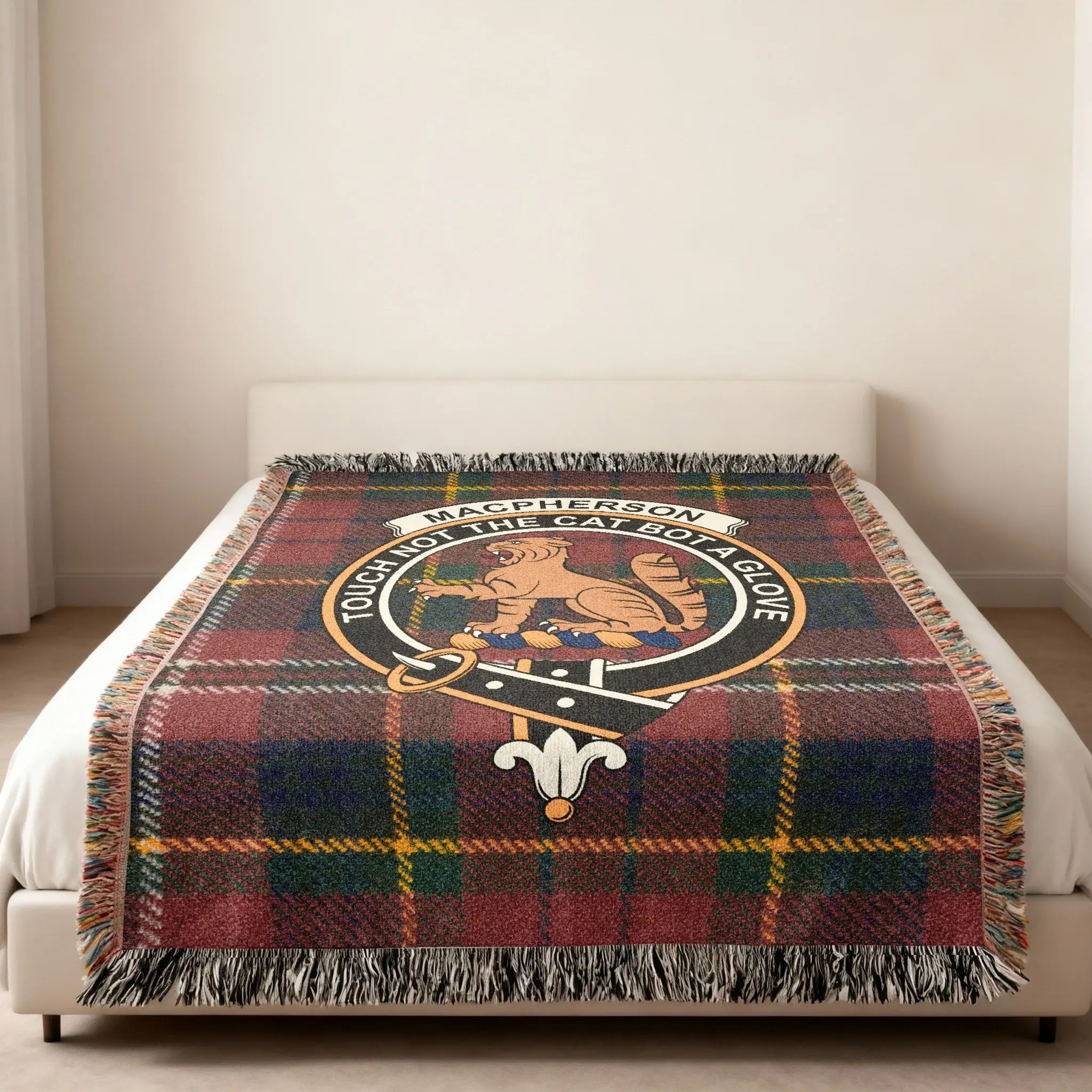 Clan MacPherson tartan woven blanket folded — 80x60 inch cotton throw with cat crest and tartan pattern