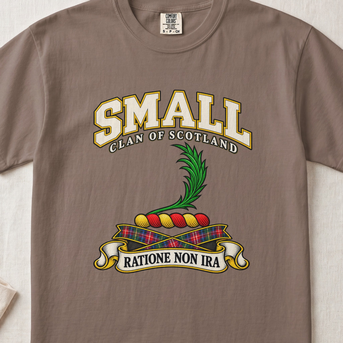 Small Scottish clan T-shirt in Espresso, front view with a green leafy frond and motto banner.
