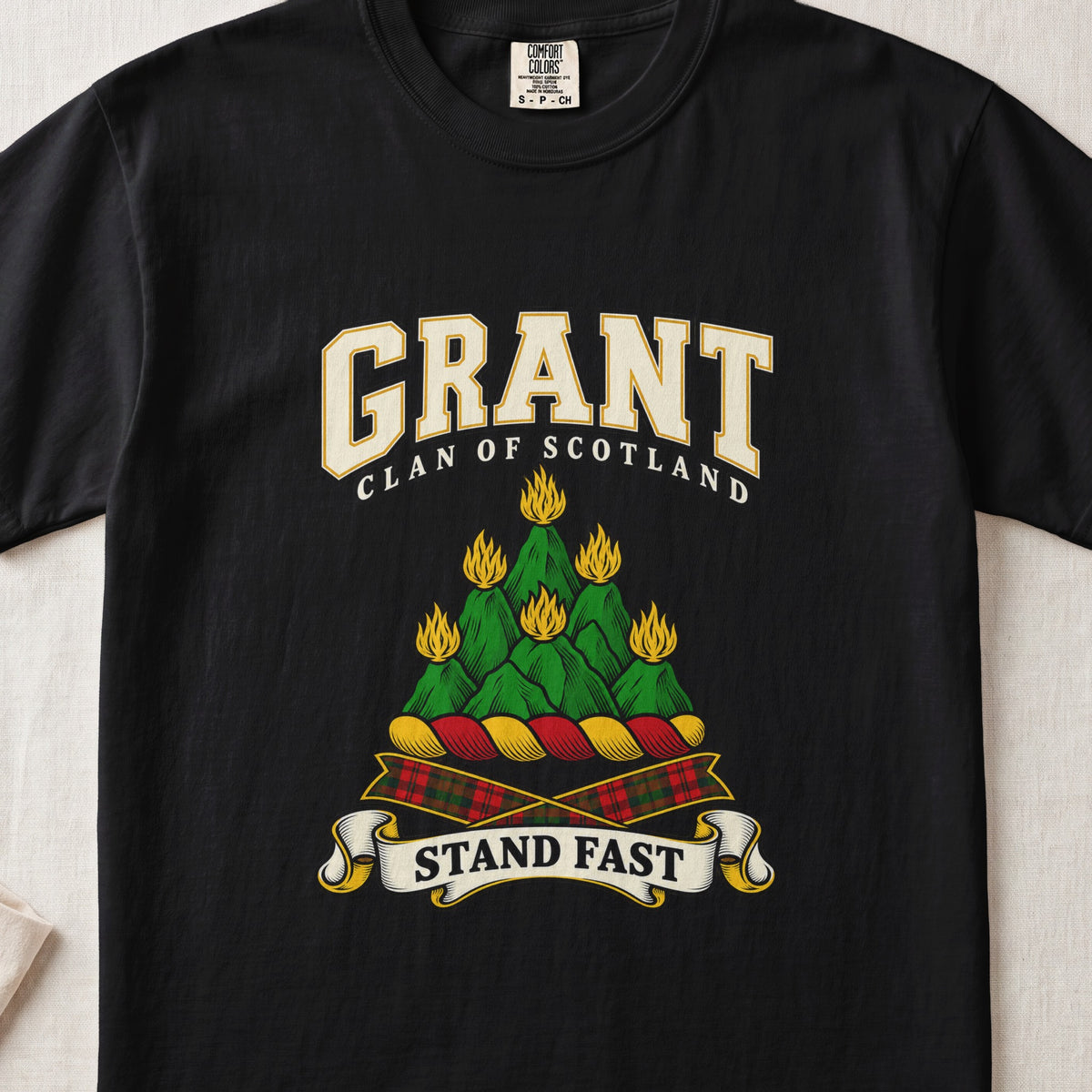 Grant graphic T-shirt in Black, front flat lay showing varsity lettering and green mountain-like mound with yellow flames.