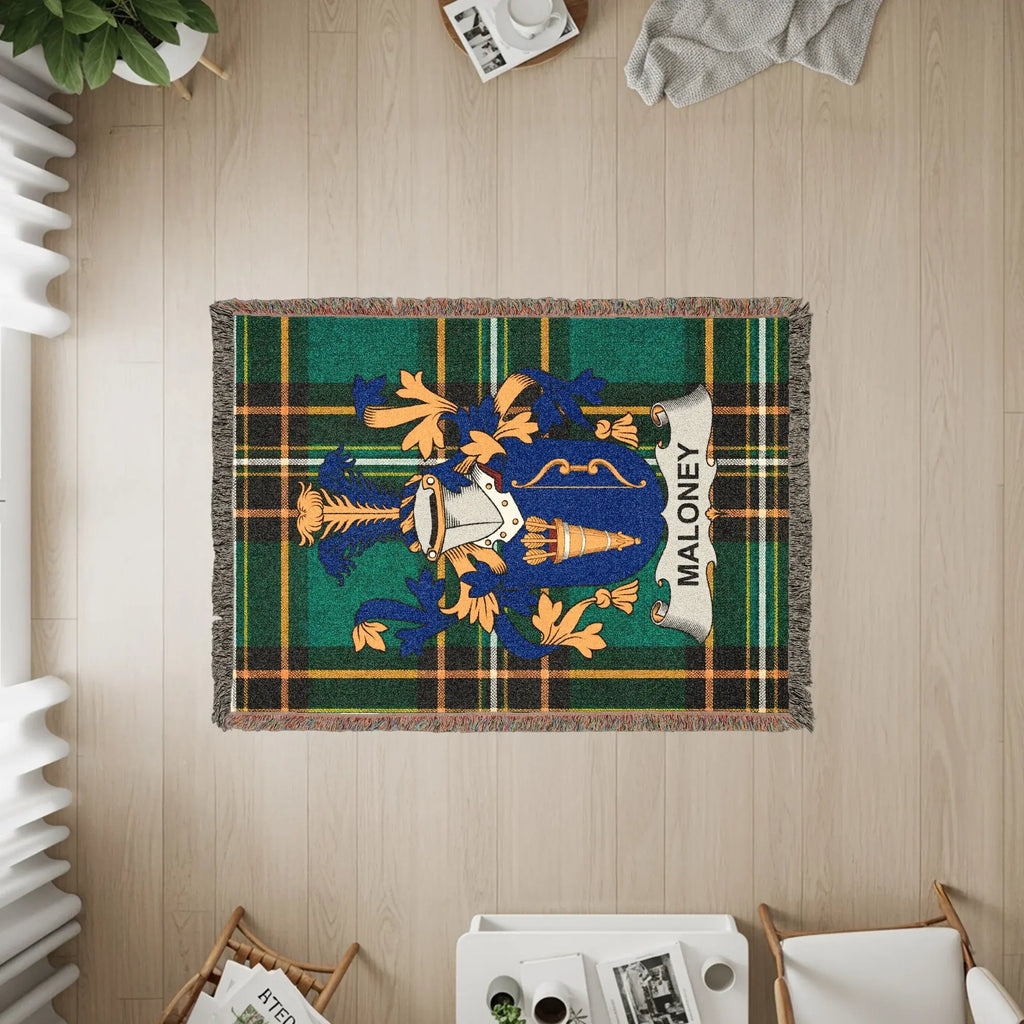 Maloney tartan woven blanket with family crest displayed.