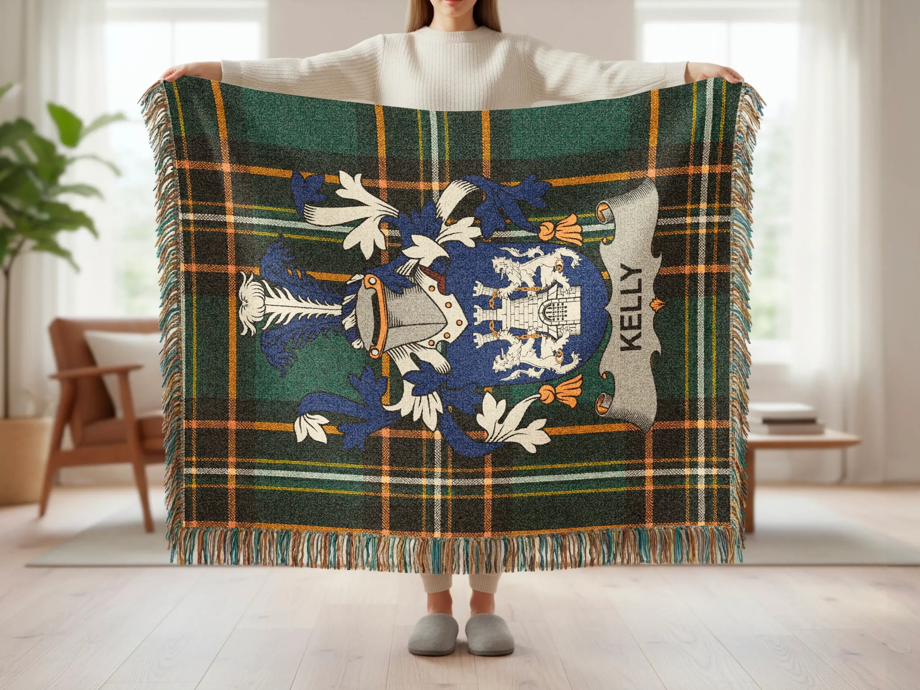 Green, blue, and yellow plaid throw blanket with the "KELLY" coat of arms.
