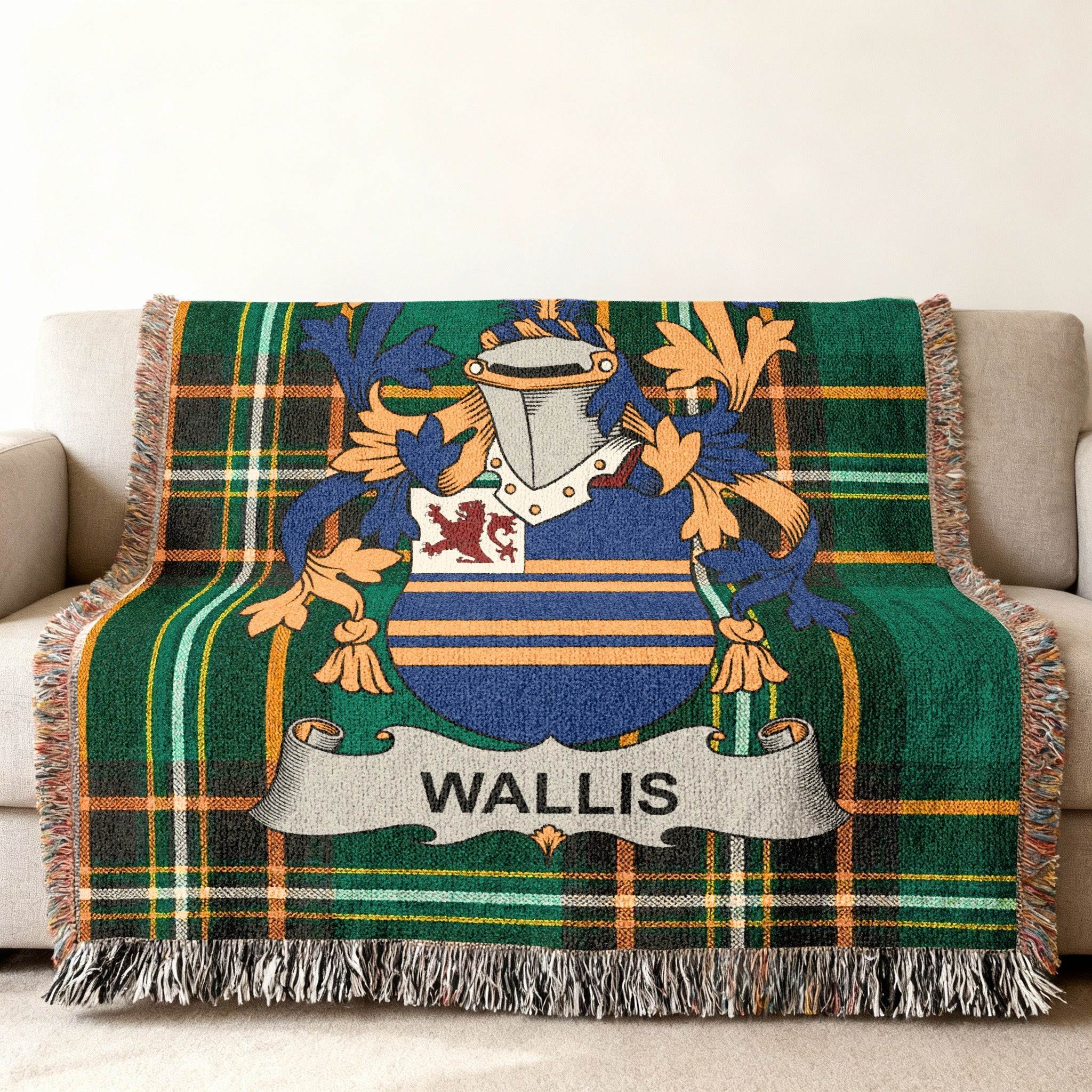 Woven throw blanket with tartan plaid and the Wallis family crest.