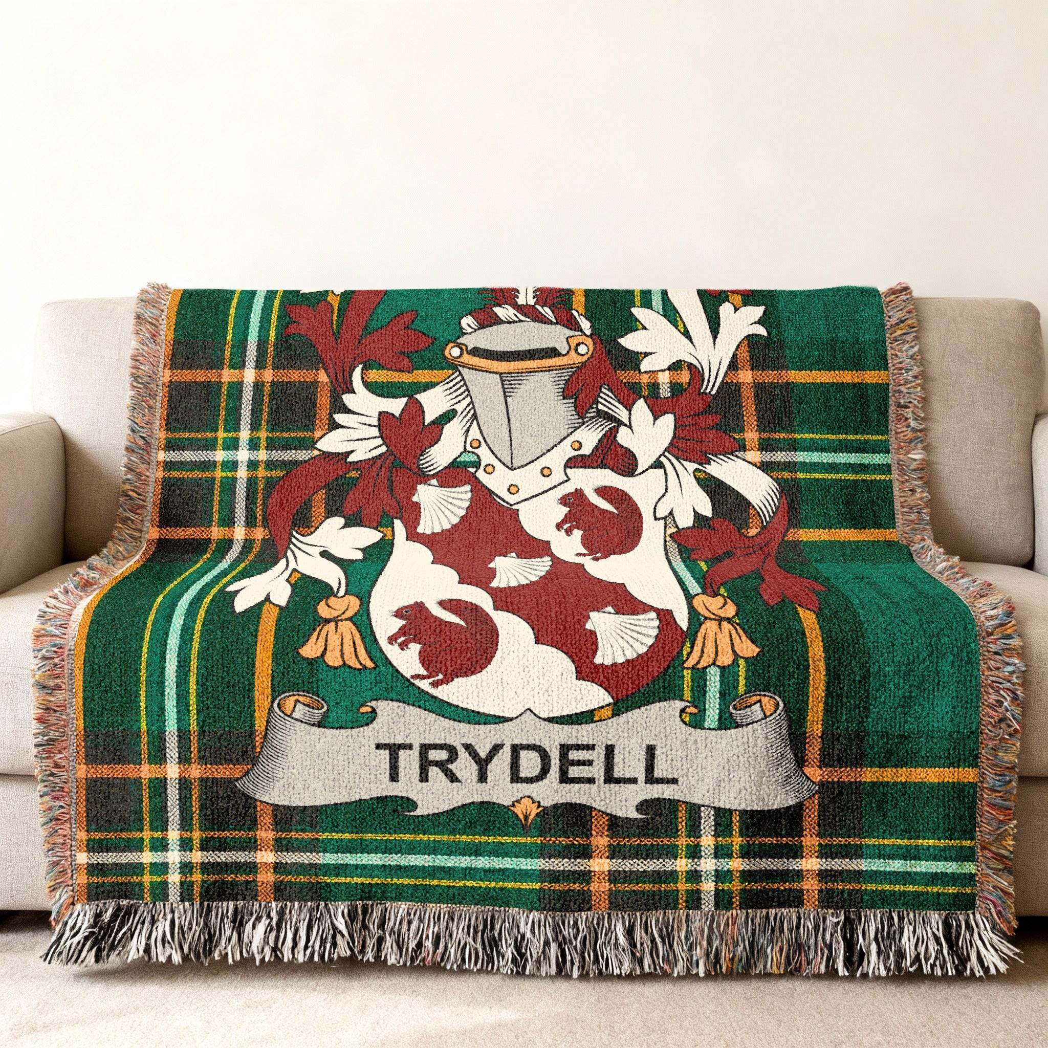 Green plaid blanket with the Trydell family crest centered.