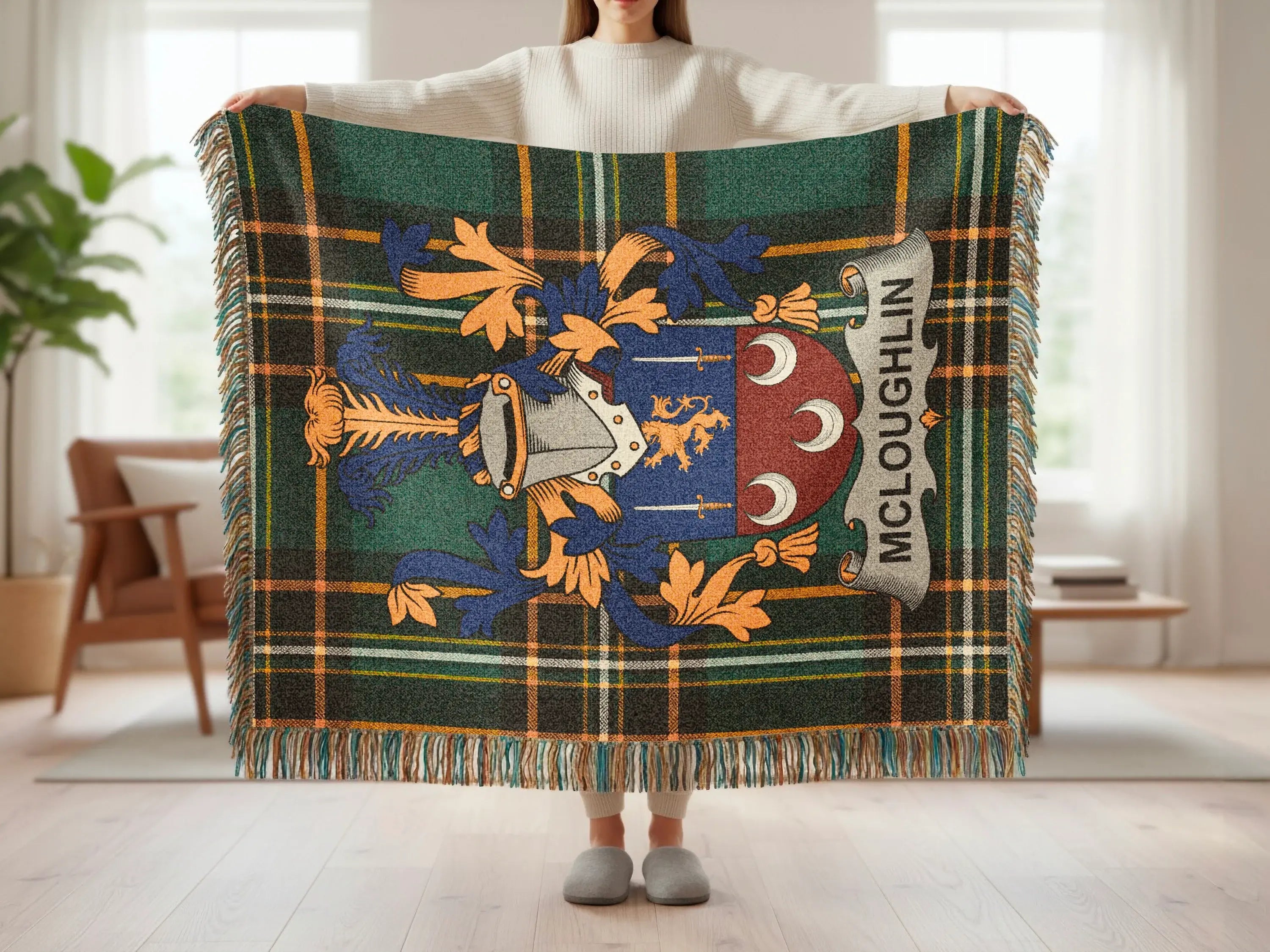 Tartan blanket with the McLaughlin family crest and shield.