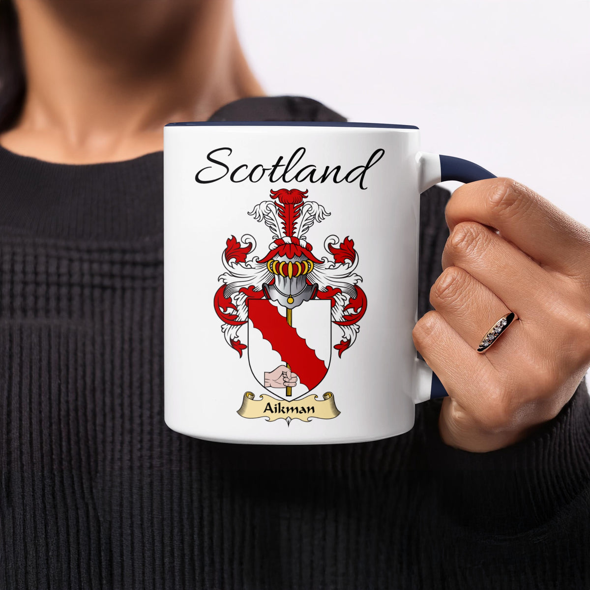 Red-accent Aikman Scottish family crest mugs with Scotland above the heraldic shield