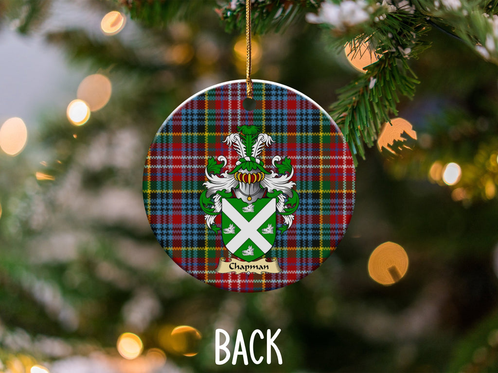 Chapman ceramic ornament detail showing a double-sided family shield on a Caledonia tartan background