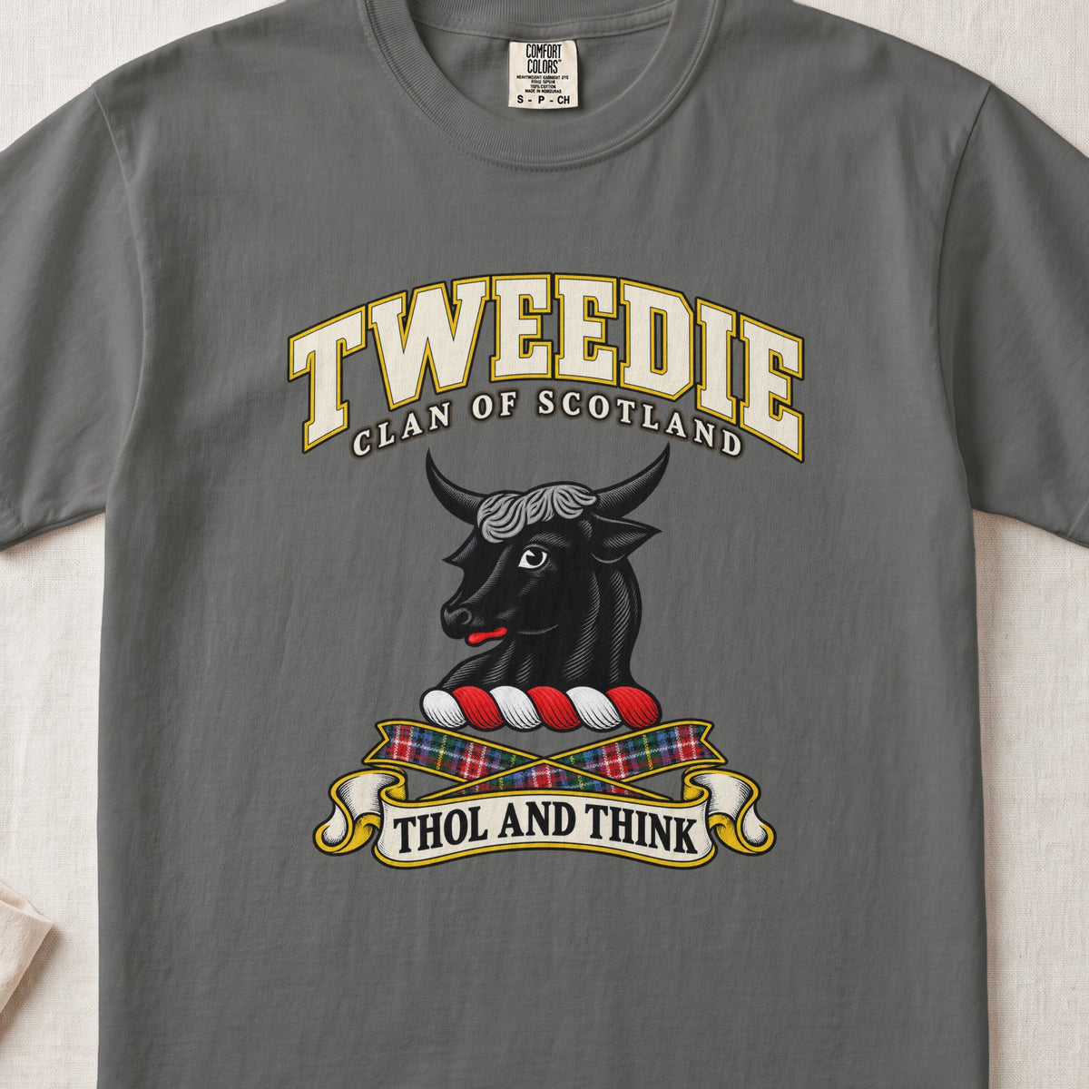 Tweedie Scottish clan T-shirt in Pepper, front view with a black bull head and motto design.